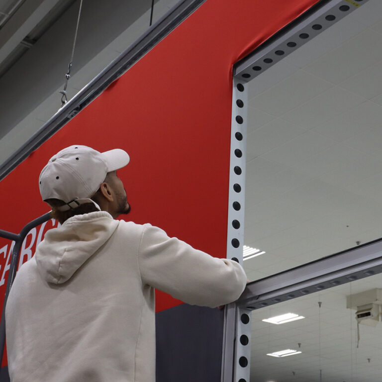 A man adjusting an SEG on a modular frame.