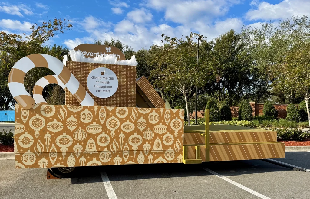 Rigid boards attached to a parade float for Advent Health.